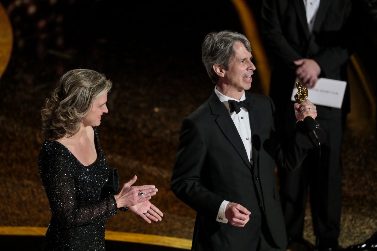Elizabeth Martin and Marshall Curry accept Oscar