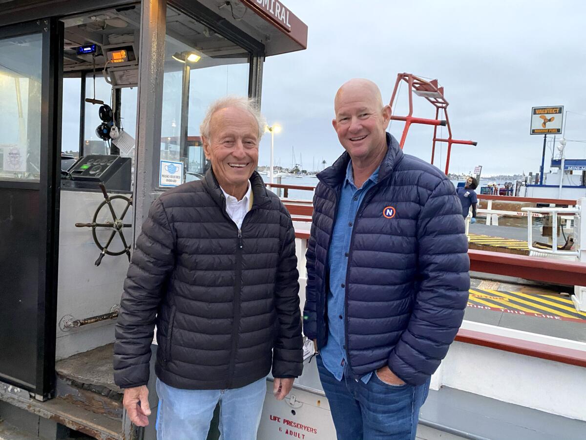 Seymour Beek and Noel Pepys on Balboa Island Ferry touring Newport Harbor.