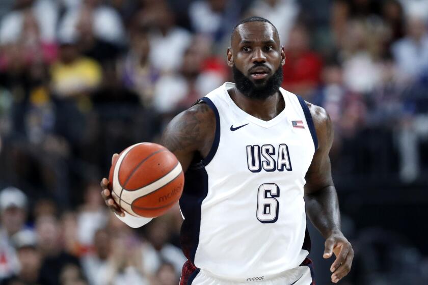 United States forward LeBron James (6) takes the ball up-court during the first half of an exhibition basketball game against Canada, Wednesday, July 10, 2024, in Las Vegas. (AP Photo/Steve Marcus)