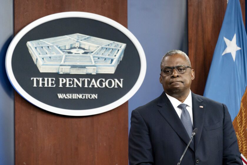 FILE - Secretary of Defense Lloyd Austin pauses while speaking during a media briefing at the Pentagon, Wednesday, Nov. 17, 2021, in Washington. In February, with the images of the violent insurrection in Washington still fresh in the minds of Americans, the newly confirmed defense secretary took the unprecedented step of signing a memo directing commanding officers across the military to institute a one-day stand-down to address extremism within the nation’s armed forces. (AP Photo/Alex Brandon, File)