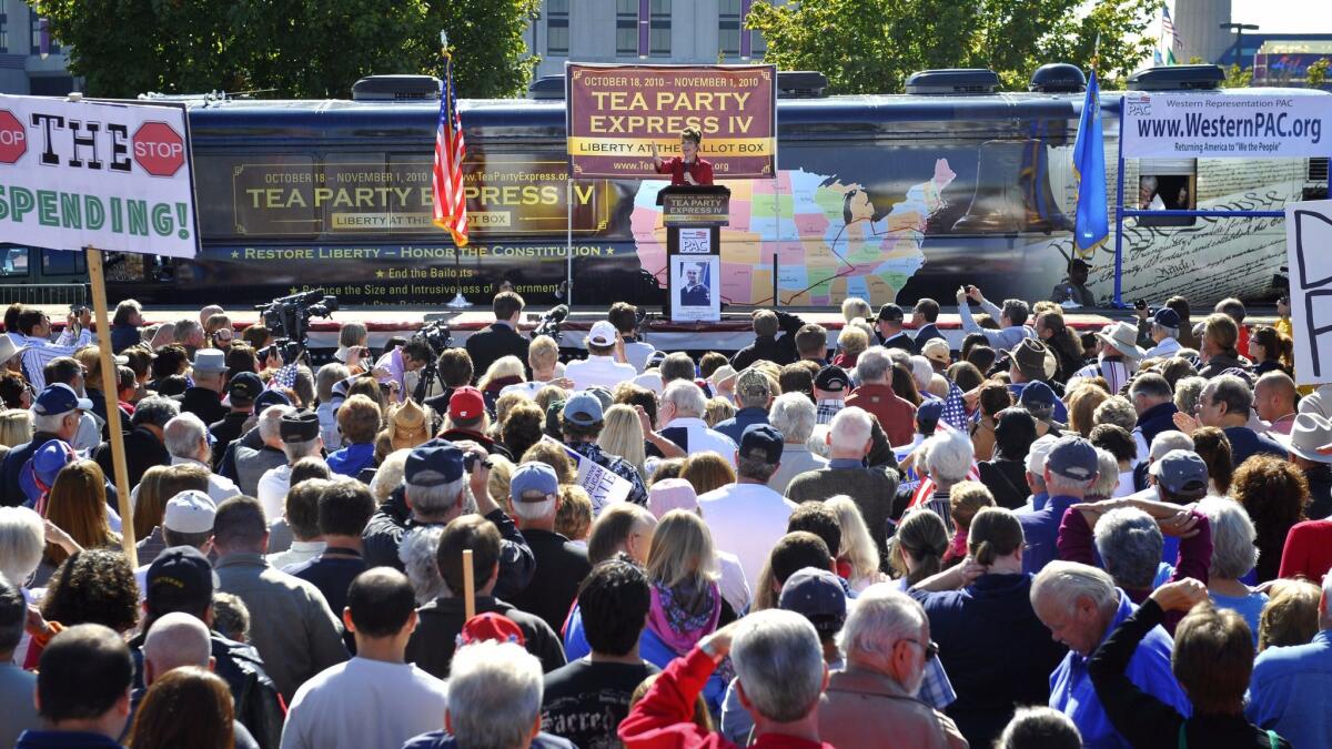 Former Alaska governor Sarah Palin speaks to a crowd during the kickoff of the nationwide Tea Party Express bus tour in Reno, Nev. on Oct. 18, 2010.