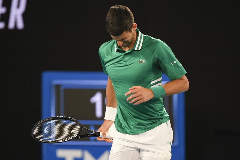 Serbia's Novak Djokovic reacts during his third round match against United States' Talyor Fritz.