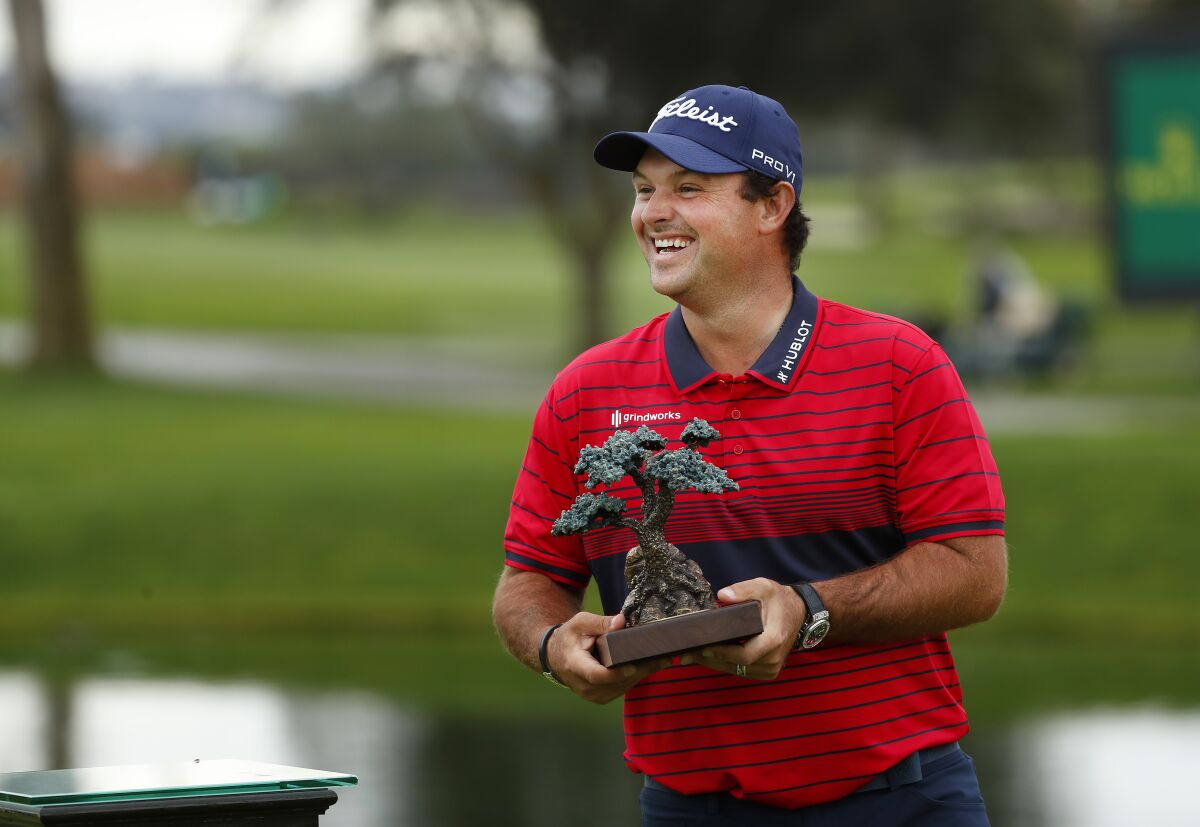 Patrick Reed celebrates his victory this year at Farmers Insurance Open at Torrey Pines.