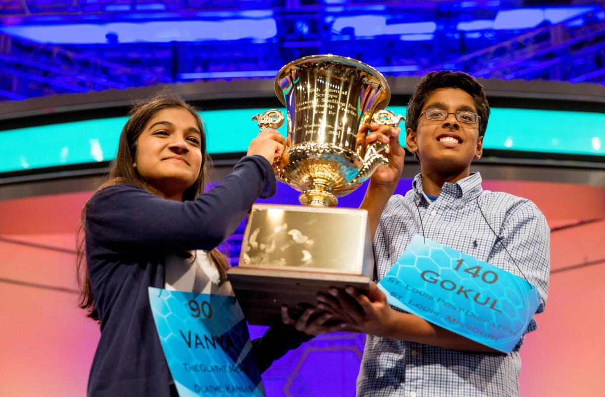 Vanya Shivashankar, left, 13, of Olathe, Kan., and Gokul Venkatachalam, 14, of St. Louis, are co-champions of the Scripps National Spelling Bee.