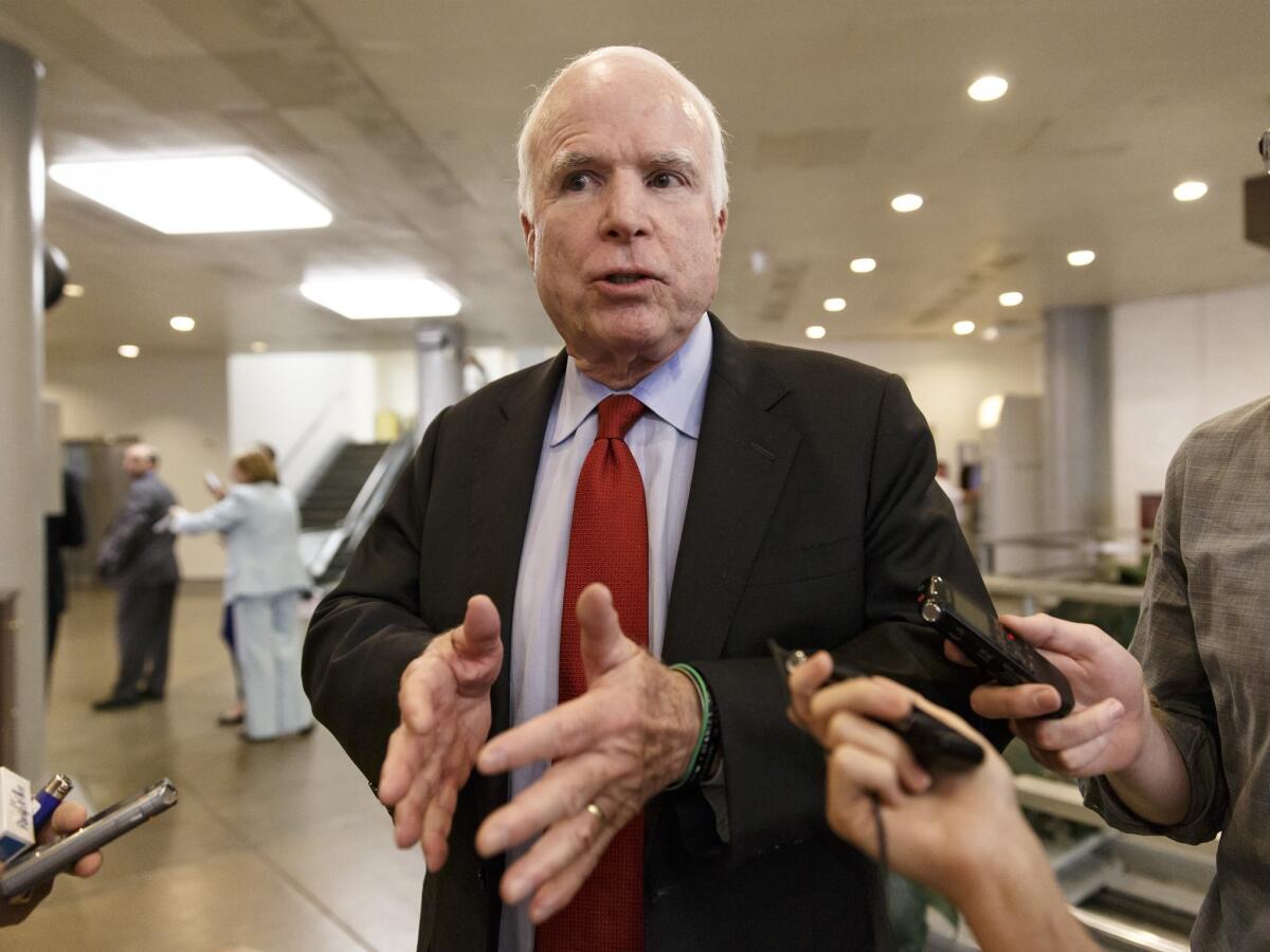 Sen. John McCain (R-Ariz.) has become the GOP's go-to campaigner this fall. Above, McCain on Capitol Hill in June.