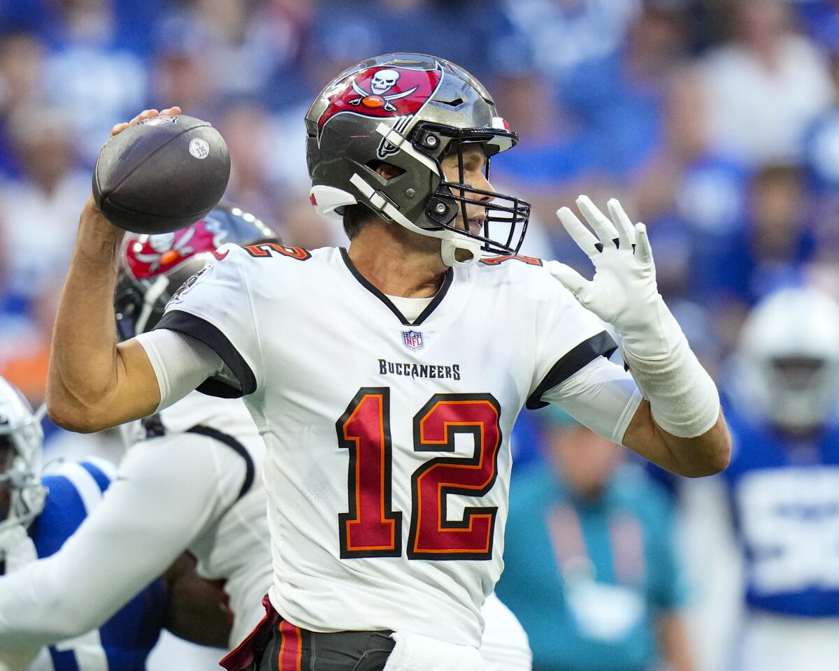 Tampa Bay Buccaneers quarterback Tom Brady (12) throws against the Indianapolis Colts in the first half of an NFL preseason preseason football game in Indianapolis, Saturday, Aug. 27, 2022. (AP Photo/AJ Mast)