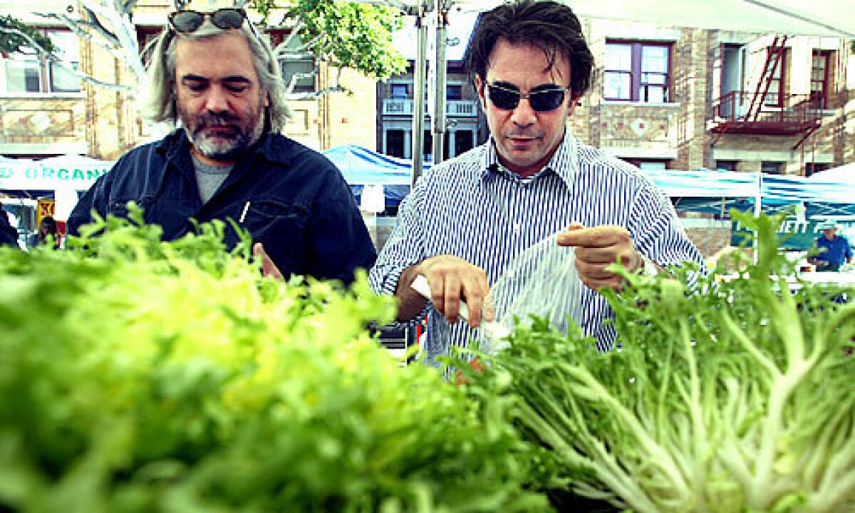 EYEING COSTS: Alain Giraud, left, Josiah Citrin and other L.A. chefs say the economic downturn is changing fine dining.