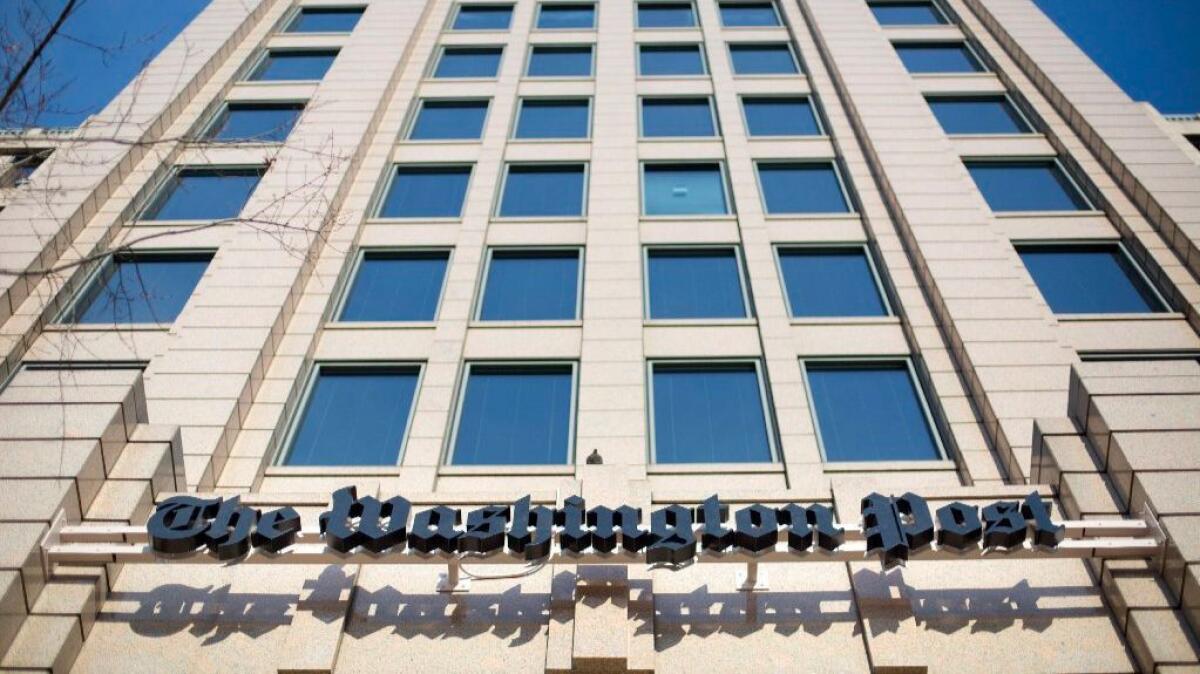 Headquarters of the Washington Post, which has adopted "Democracy Dies in Darkness" as its new motto.