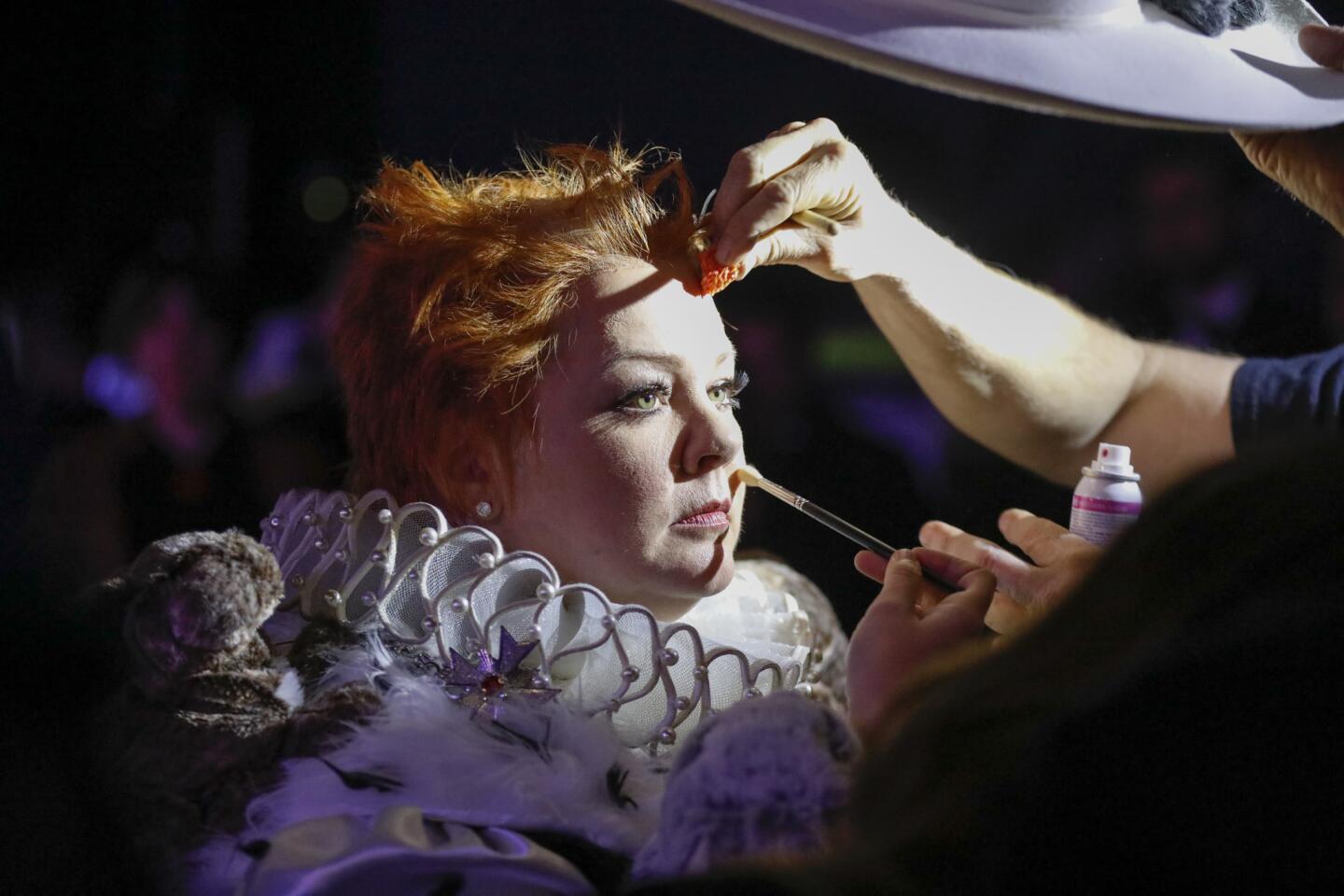 Presenter Melissa McCarthy gets a makeup touch-up backstage before heading onstage to hand out the award for costume design.