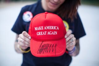 Diana Noschang, of Newburgh, N.Y., holds a "Make America Great Again" hat autographed by Republican presidential candidate Donald Trump, Monday, April 25, 2016, in Wilkes-Barre, Pa. (Christopher Dolan/The Times & Tribune via AP) WILKES BARRE TIMES-LEADER OUT; MANDATORY CREDIT