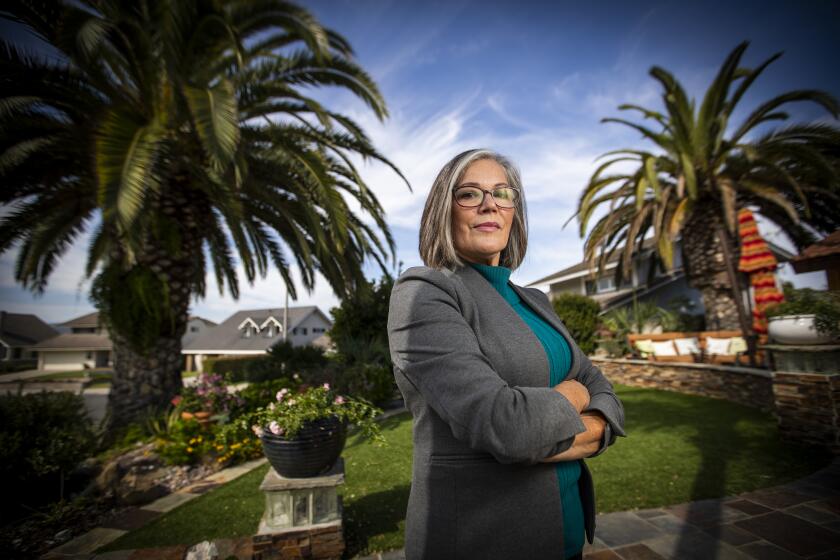 DANA POINT, CALIF. -- WEDNESDAY, SEPTEMBER 25, 2019: Esther M. Hermida, President of GeoLingua Inc., a one-woman translation and interpretation company at her home office in Dana Point Wednesday, Sept. 25, 2019. Hermida hires independent contractors, works as an independent contractor herself and is not happy with Assembly Bill 5. Different businesses are affected by the sweeping new AB 5, which writes into law a strict test before companies can classify workers as contractors. (Allen J. Schaben / Los Angeles Times)
