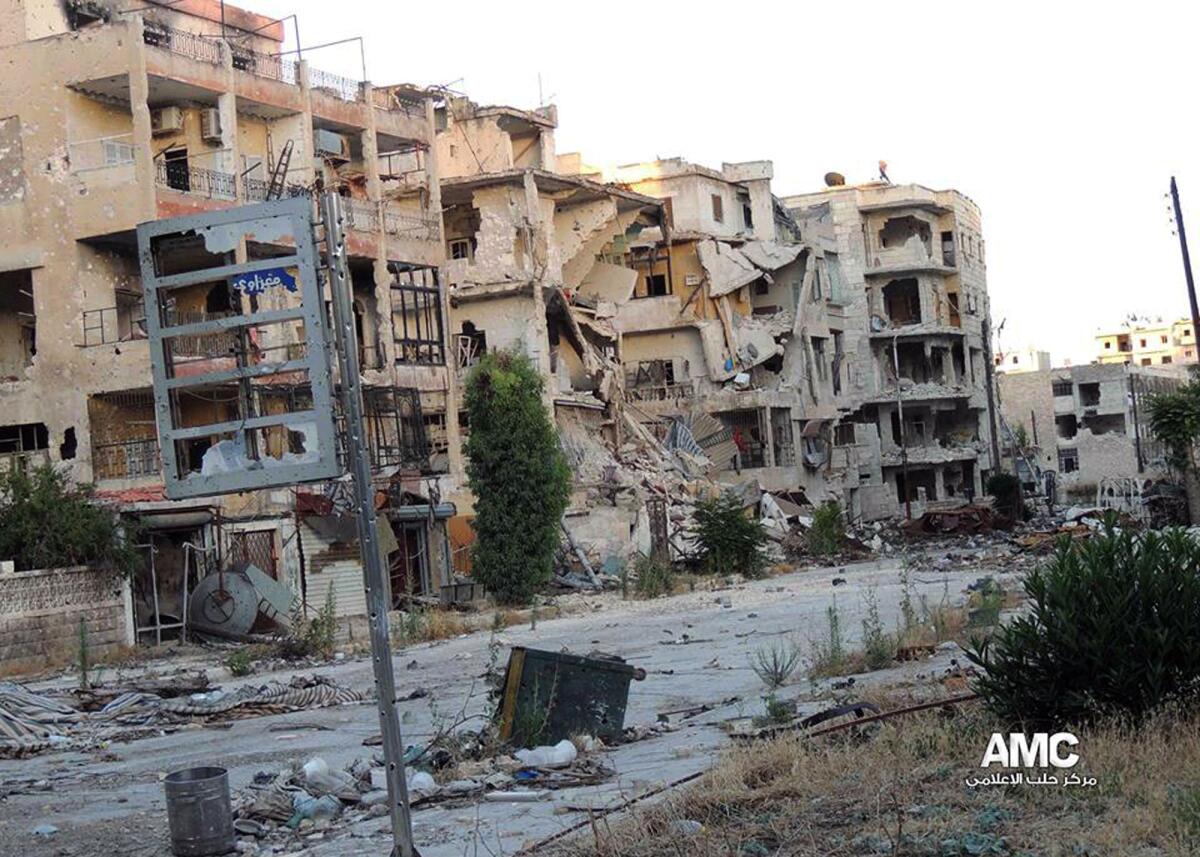 Damaged buildings in Aleppo, Syria, where government warplanes bombed rebel positions in fighting over a nearby military base.