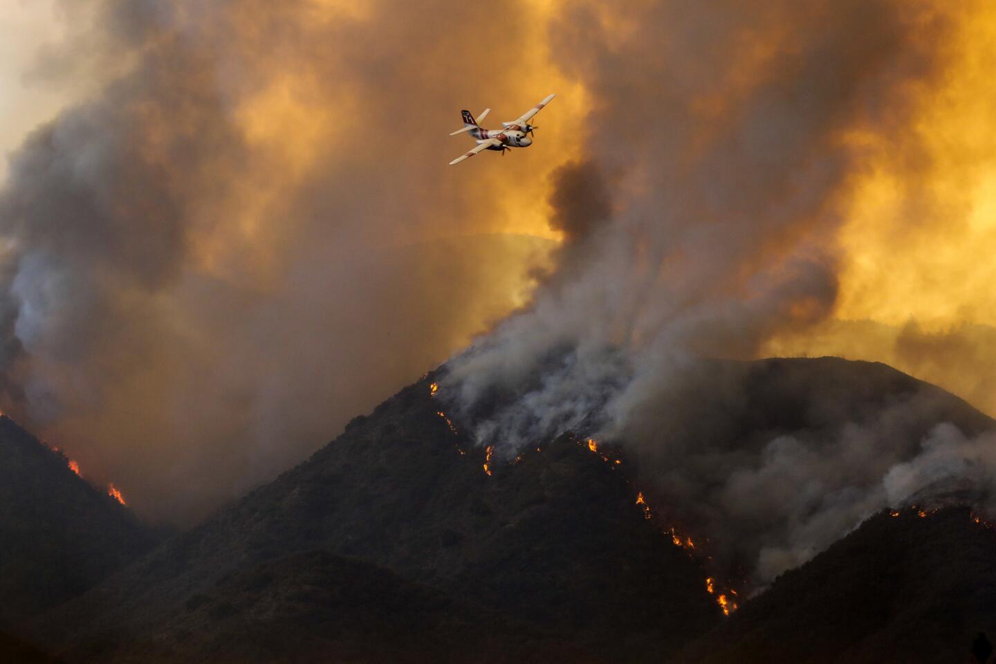 The Holy fire in the Cleveland National Forest pushed closer to some homes Wednesday, prompting a new round of mandatory evacuations.