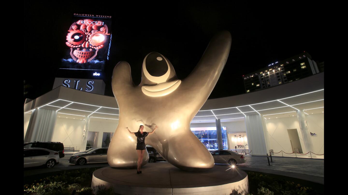 French designer Philippe Starck created "Saam," a caricature of Sam Nazarian that adorns the main porte-cochere of the SLS Las Vegas.