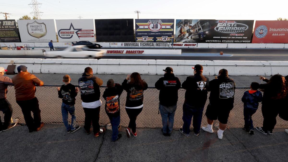 Spectators at the drag races at Irwindale Speedway.