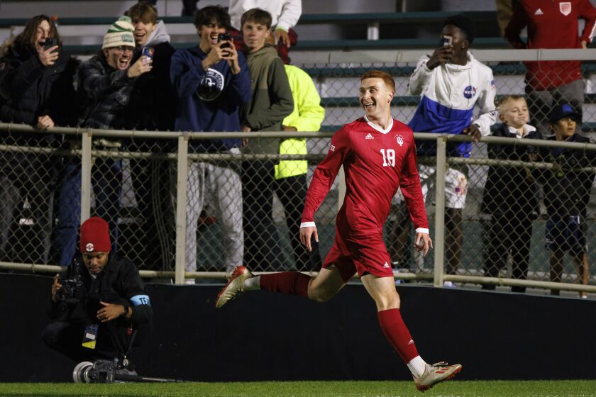 Indiana's Ryan Wittenbrink celebrates after scoring a goal during the first half of the team's NCAA men's soccer tournament semifinal against Pittsburgh in Cary, N.C., Friday, Dec. 9, 2022. (AP Photo/Ben McKeown)