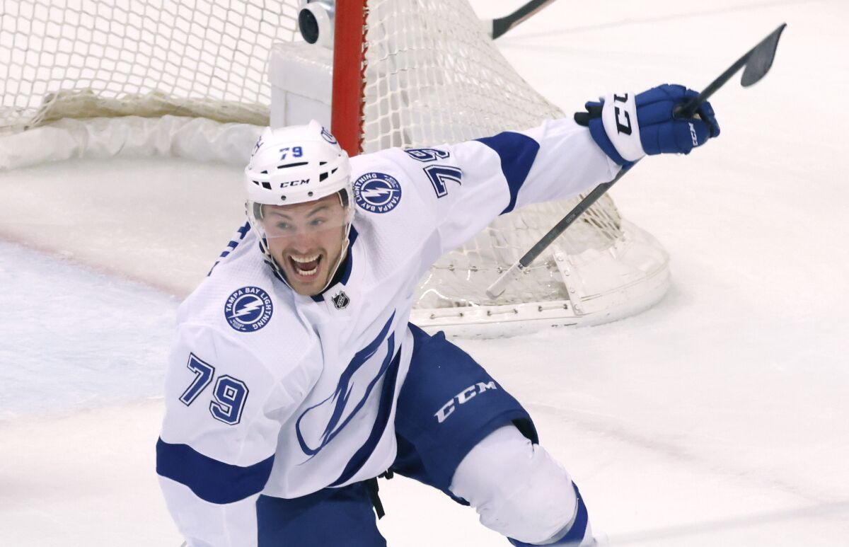 Tampa Bay Lightning center Ross Colton celebrates scoring against the Florida Panthers in the closing seconds of Game 2 of an NHL hockey second-round playoff series Thursday, May 19, 2022, in Sunrise, Fla. (AP Photo/Reinhold Matay)