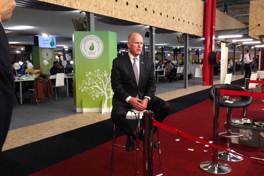 Gov. Jerry Brown sits for an Dec. 7 interview with CNN in Le Bourget, France.