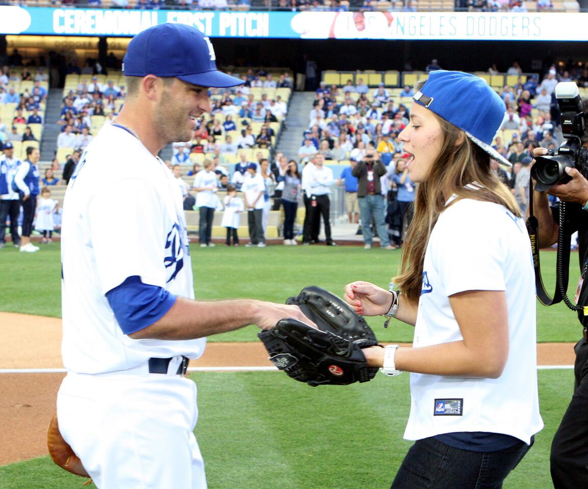 Photo Gallery: Olympian Kate Hansen throws out first pitch of Dodger game