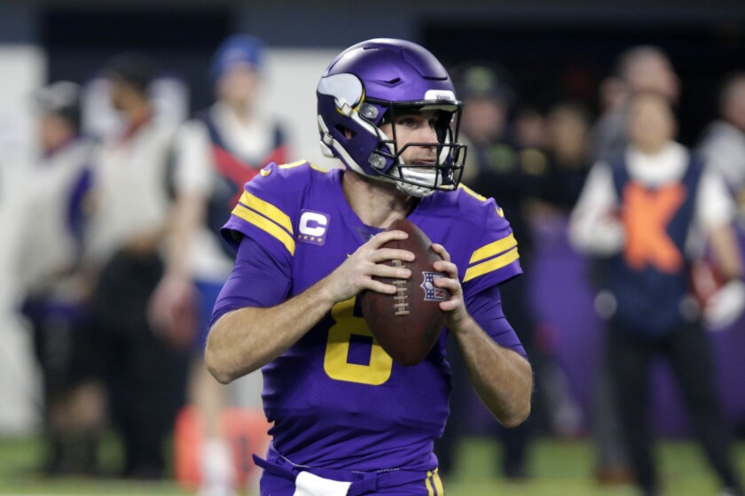 Minnesota Vikings quarterback Kirk Cousins (8) looks to pass during the first half of an NFL football game against the Pittsburgh Steelers, Thursday, Dec. 9, 2021, in Minneapolis. (AP Photo/Andy Clayton-King)