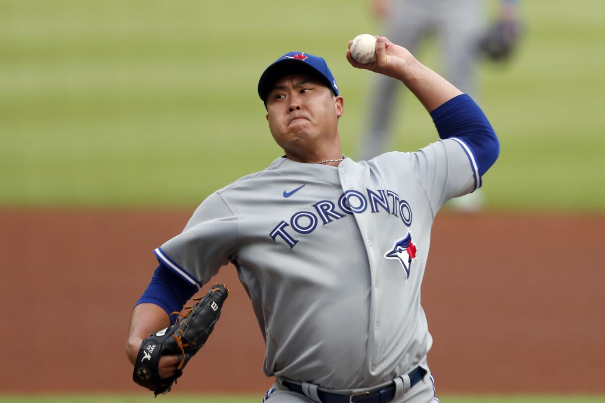 Toronto Blue Jays starting pitcher Hyun-Jin Ryu (99), of South Korea, works in the first inning of a baseball game against the Atlanta Braves Wednesday, Aug. 5, 2020, in Atlanta. (AP Photo/John Bazemore)