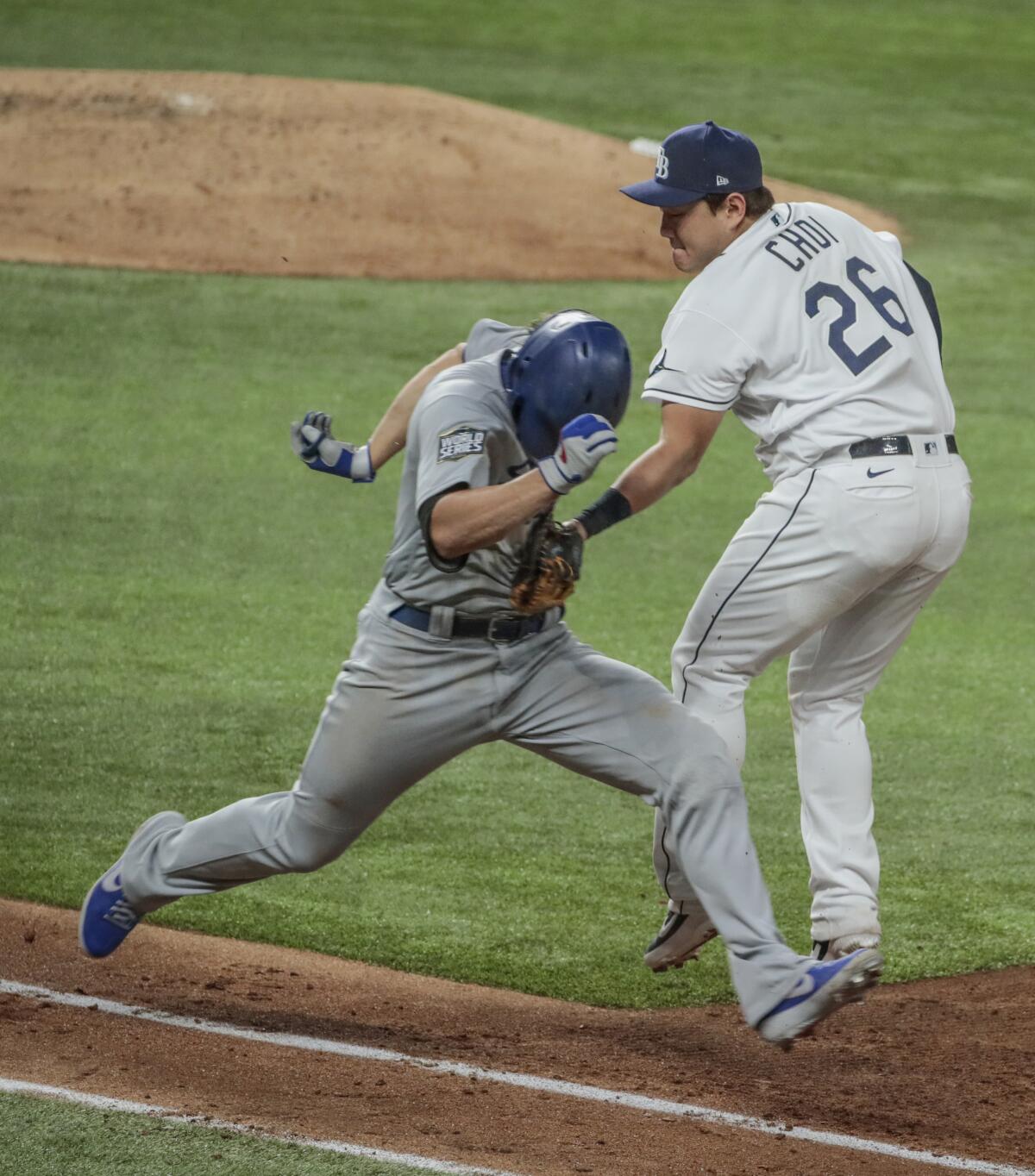 Corey Seager is tagged out by Rays first baseman Ji-Man Choi.