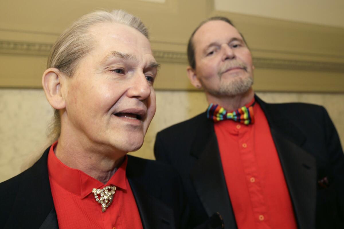 Robert Loyd, left, and John Schenck of Conway, Ark., at the Pulaski County Courthouse April 17 after a hearing on ending Arkansas' ban on same-sex marriage.