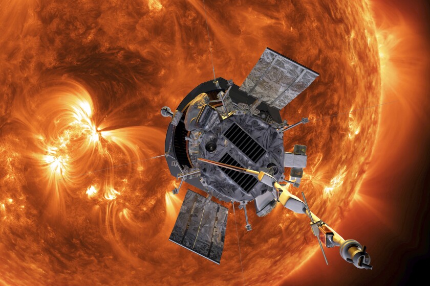 FILE - This image made available by NASA shows an artist's rendering of the Parker Solar Probe approaching the Sun. On Tuesday, Dec. 14, 2021, NASA announced that the spacecraft has plunged through the unexplored solar atmosphere known as the corona in April, and will keep drawing ever closer to the sun and diving deeper into the corona. (Steve Gribben/Johns Hopkins APL/NASA via AP)