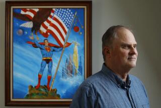 SAN DIEGO, CA - JULY 17: El Cajon Councilmember Gary Kendrick stands in front of a Wayne Boring painting in his El Cajon home that he bought at Comic-Con in 1985 on Monday, July 17, 2023. (K.C. Alfred / The San Diego Union-Tribune)