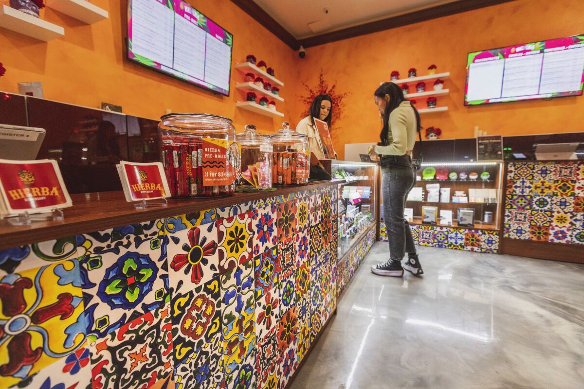 The colorful interior of a Boyle Heights dispensary with tile-print counters