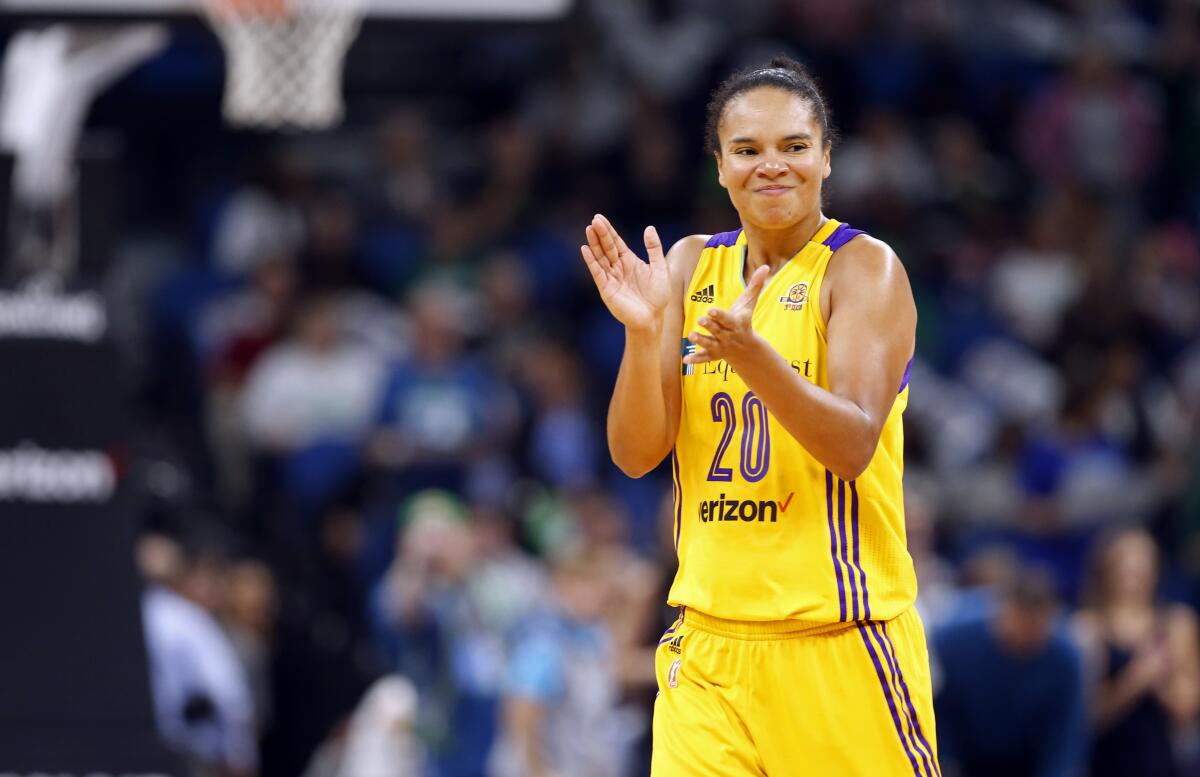 Sparks guard Kristi Toliver claps while playing against the Minnesota Lynx during Game 2 of the 2016 WNBA Finals.