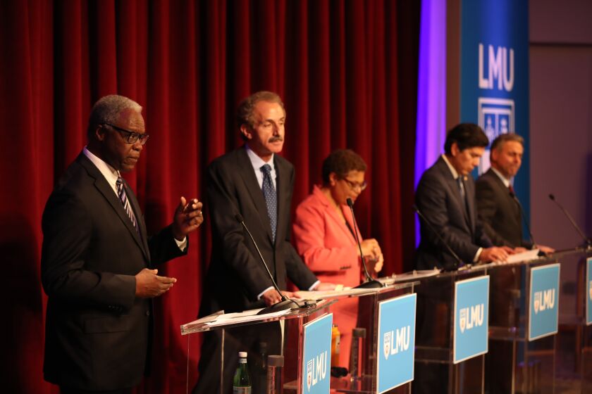 Los Angeles, CA -Tuesday, February 22, 2022: Loyola Marymount University hosts the first L.A. mayoral debate of the year for candidates, Tuesday, Feb. 22, 2022. From left are Realtor Mel Wilson, L.A. City Attorney Mike Feuer, Rep. Karen Bass, L.A. City Councilmembers Kevin de Leon and Joe Buscaino.(Allen J. Schaben / Los Angeles Times)