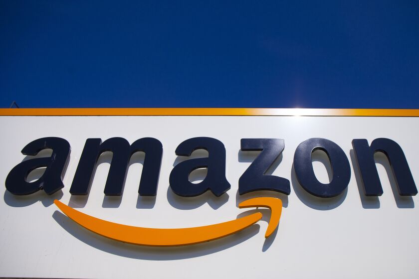 FILE - The Amazon logo is seen in Douai, northern France, April 16, 2020. Amazon said Wednesday, Nov. 30, 2022, that it had its biggest Thanksgiving holiday shopping weekend, aided by a record number of consumers looking for deals online amid high inflation. (AP Photo/Michel Spingler, File)