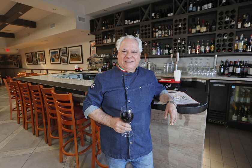 Italian-born Domenico Maurici from Tropea, Italy, stands in il Farro, a restaurant he opened in Newport Beach in 1993 and still successful today. The restaurant celebrates its 30 anniversary on Sunday.