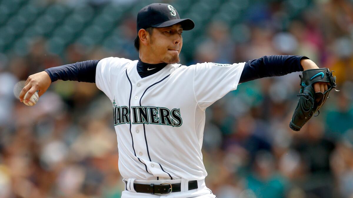 Mariners starter Hisashi Iwakuma struck out seven and walked three in pitching a no-hitter against the Orioles on Aug. 12 in Seattle.