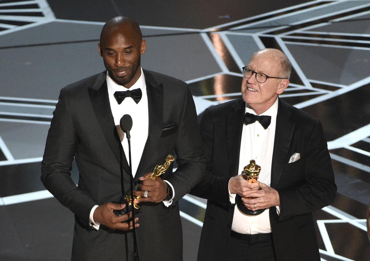 Kobe Bryant and Glen Keane accept the Academy Award for animated short on March 4.