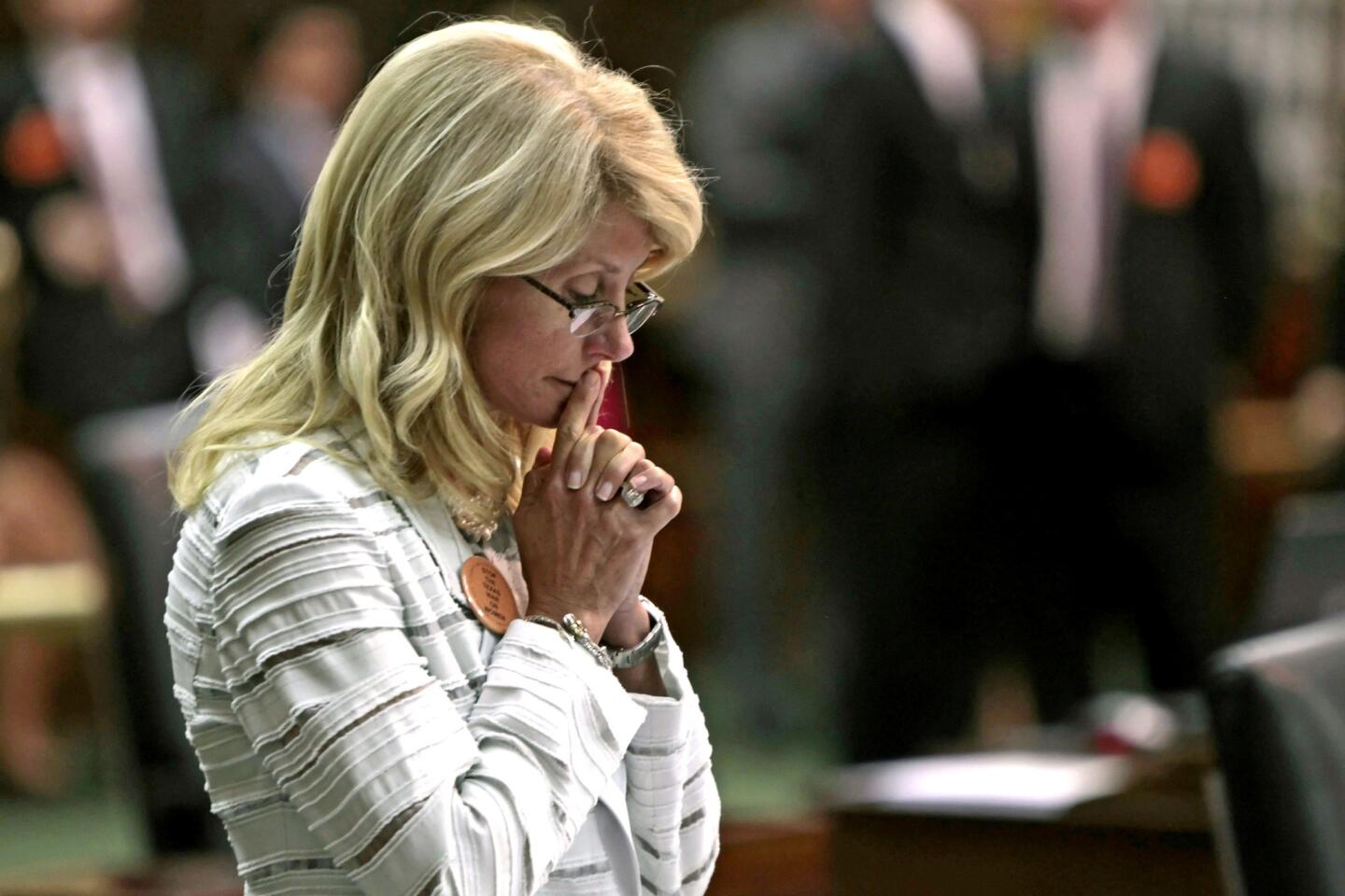 Texas state Sen. Wendy Davis (D-Fort Worth) was still standing after her 13-hour filibuster and the blocking of a vote on Republicans' antiabortion bill before midnight Tuesday.
