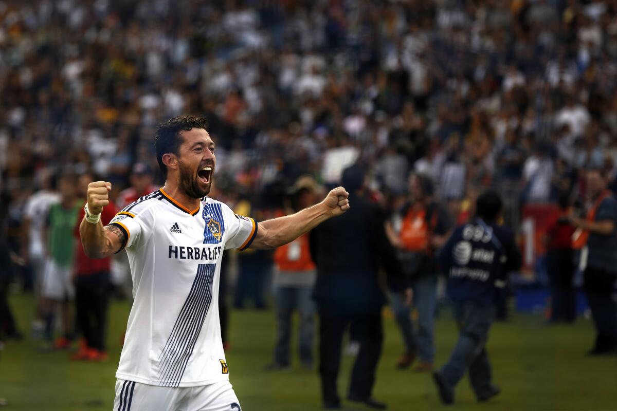 Galaxy defender Dan Gargan celebrates the team's 2-1 over the New England Revolution during the MLS Cup championship game in 2014.