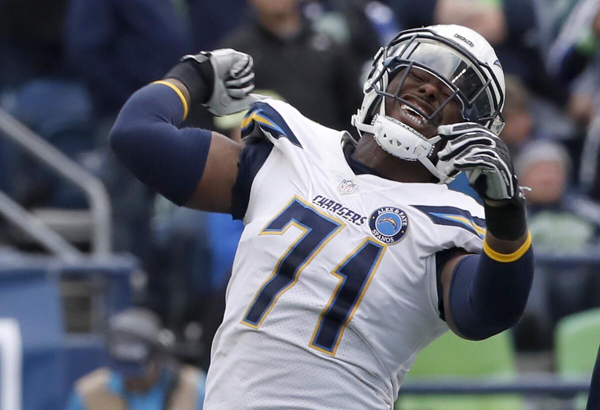 Chargers have re-signed Damion Square, shown celebrating after sacking Seattle Seahawks quarterback Russell Wilson. 
