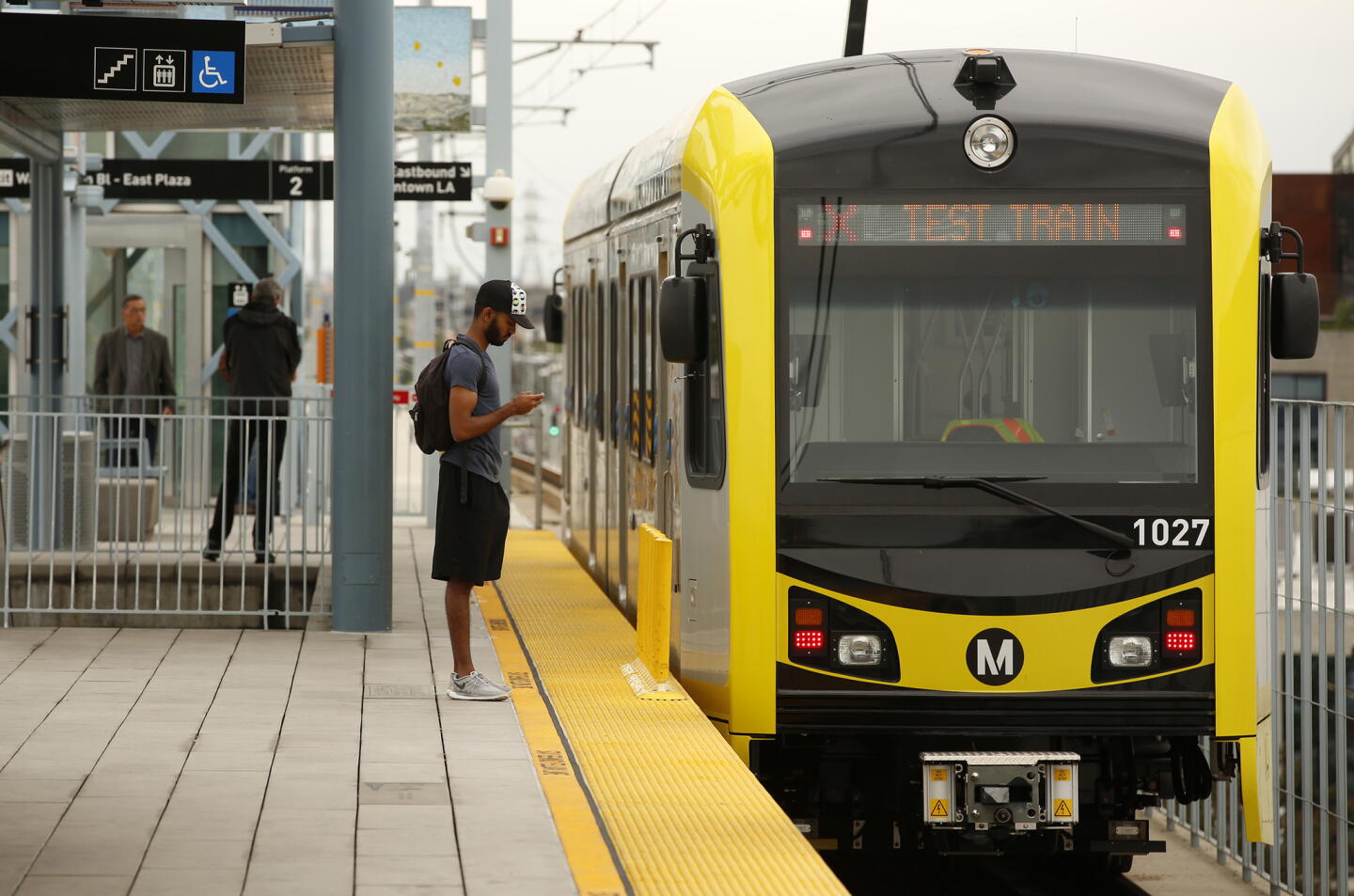 Metro passengers wait at the Culver City Station as test trains run between the station and downtown Santa Monica on May 9.