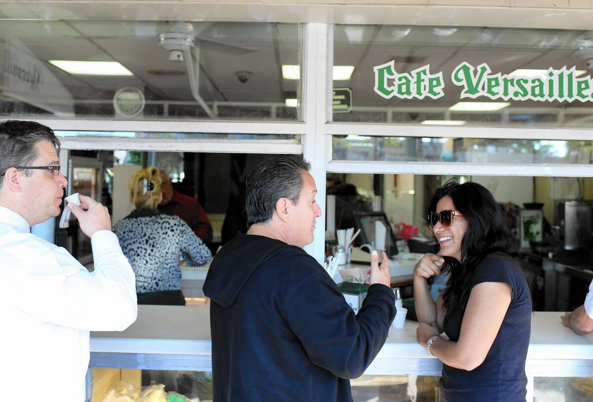 The Versailles coffee shop is an epicenter of Cuban American life in Miami. People often gather here for enthusiastic, almost ceaseless conversations.