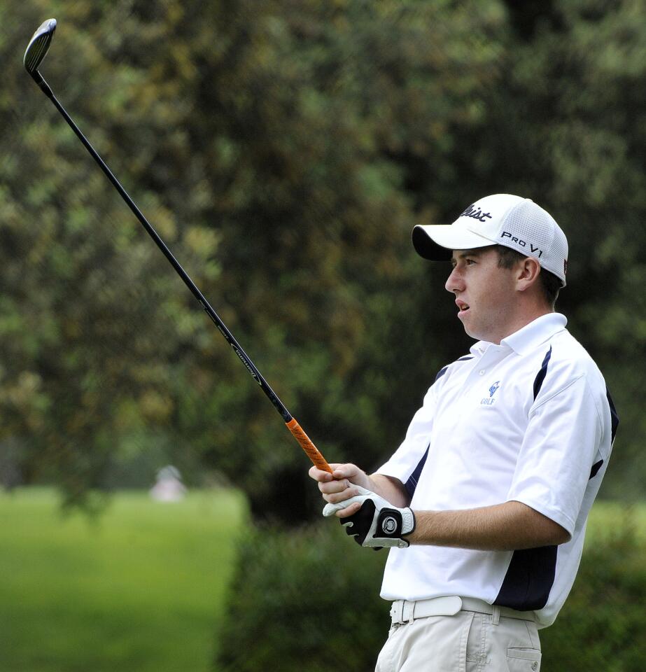 Crescenta Valley's Cody Renfro tees off on the 6th in a Pacific League golf match at Brookside Golf Course in Pasadena on Wednesday, May 7, 2014.