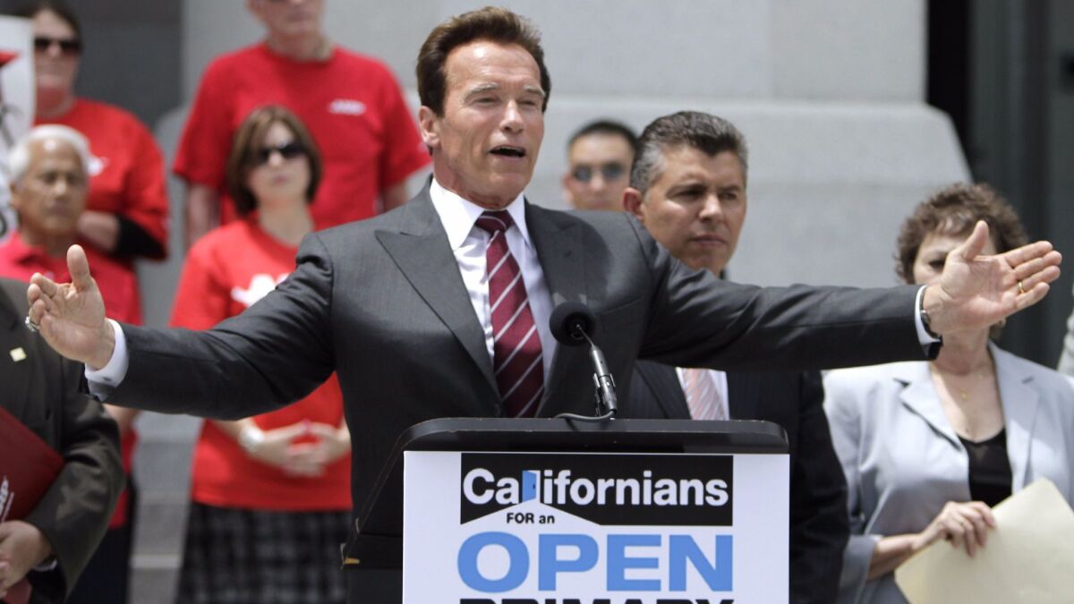 Gov. Arnold Schwarzenegger celebrates the passage of Proposition 14, the open primaries initiative, June 9, 2010.