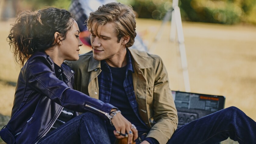 Tristin Mays and Lucas Till lean in to kiss on "MacGyver."