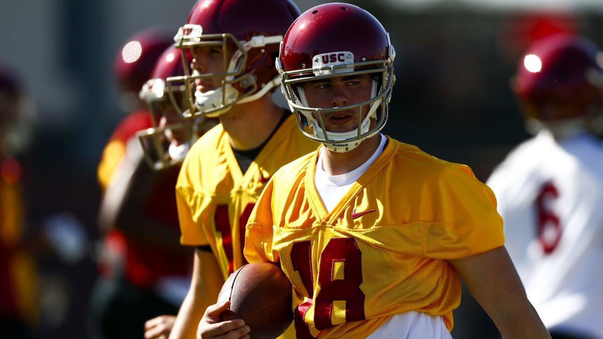 USC quarterback JT Daniels completed seven of eight passes during seven-on-seven drills and hit his first three passes with the first-team offense in 11-on-11s.