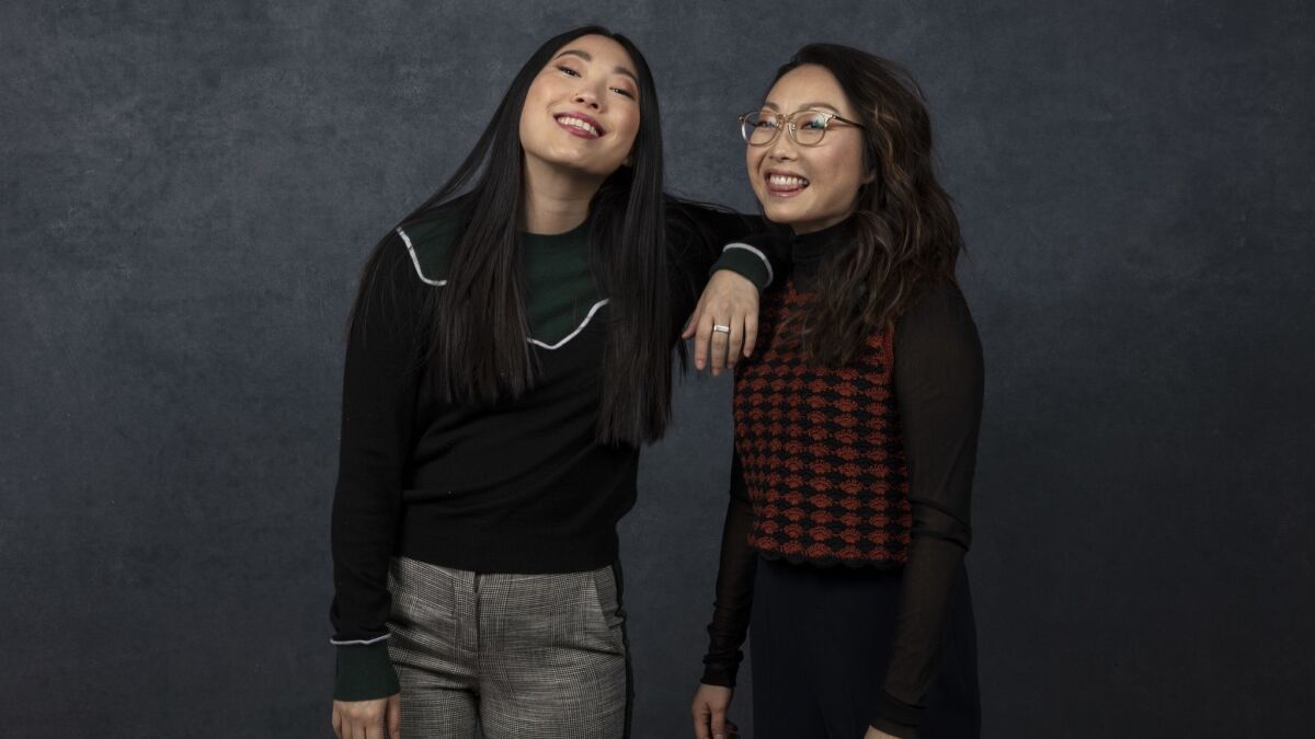 Awkwafina, left, and director Lulu Wang join forces on "The Farewell," in theaters July 12.