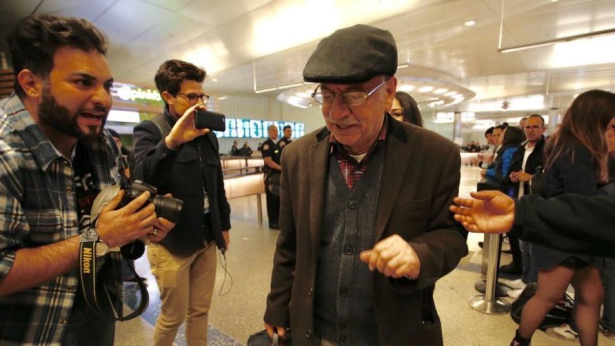 Reza Taghizadeh, 78, an artist from Iran who holds a green card, was detained and released at Tom Bradley International Terminal at LAX.