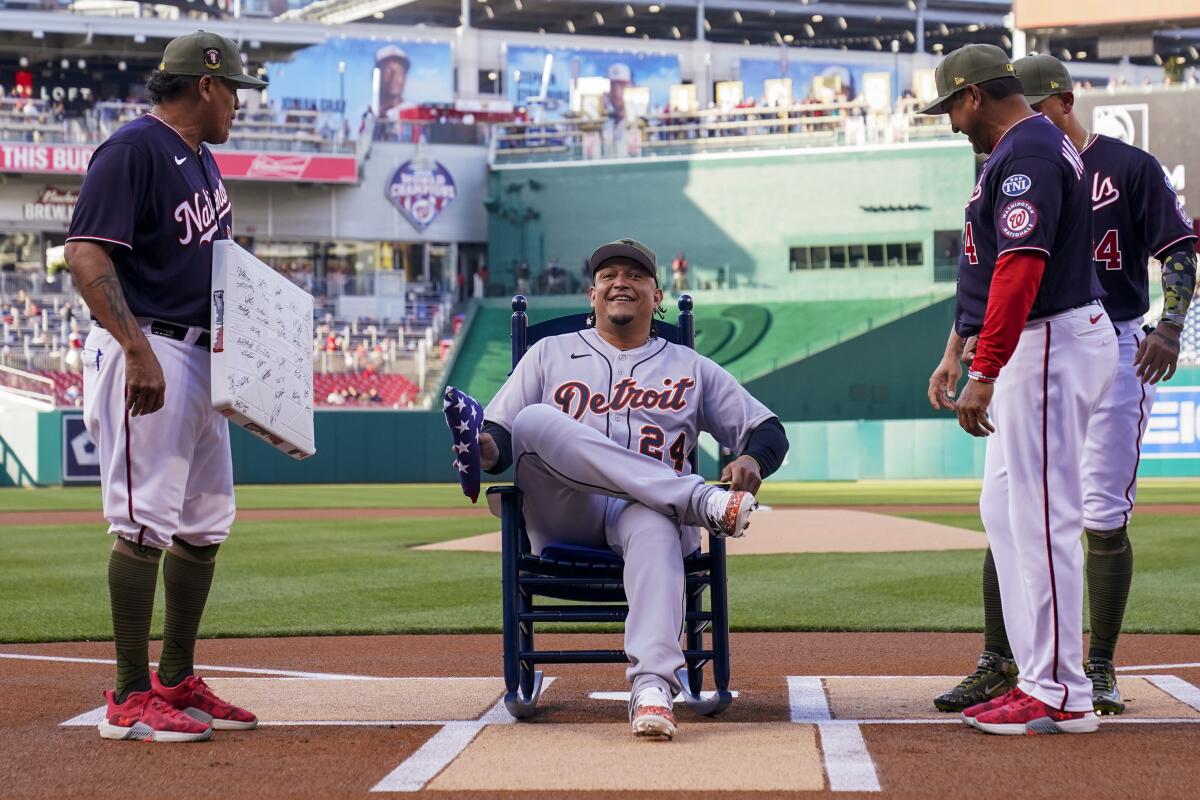 Miguel Cabrera sits in a rocking chair given to him by the Washington Nationals