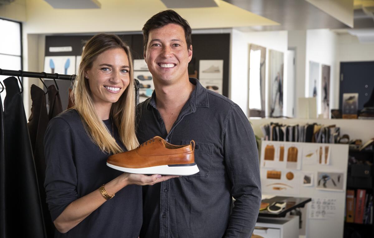 Hope Schneider, Wolf & Shepherd co-founder and head of marketing, and husband Justin Schneider, founder and chief executive