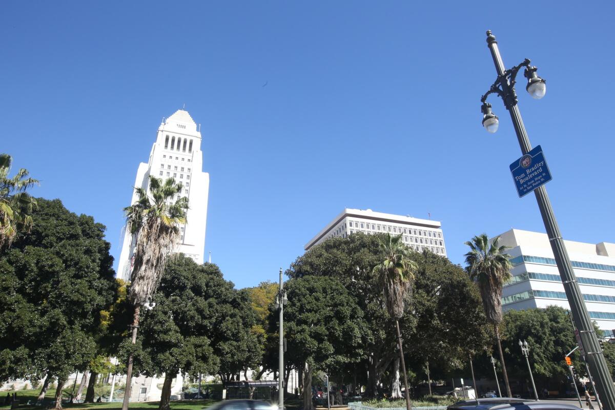 L.A. City Hall is largely closed to the public to stem the spread of the novel coronavirus, but some municipal services are still running. Above, Los Angeles Civic Center.